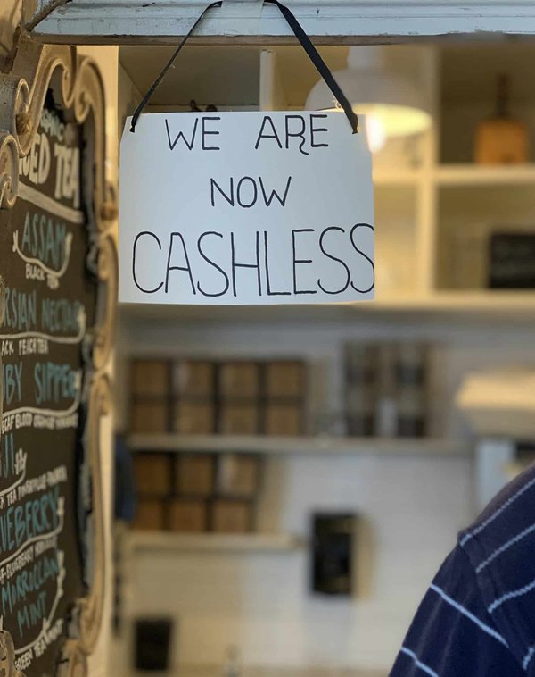 What Are the Challenges and Opportunities in UK's Transition to Cashless Transactions?